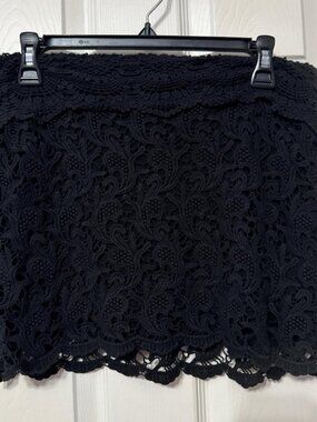 Black lace mini skirt